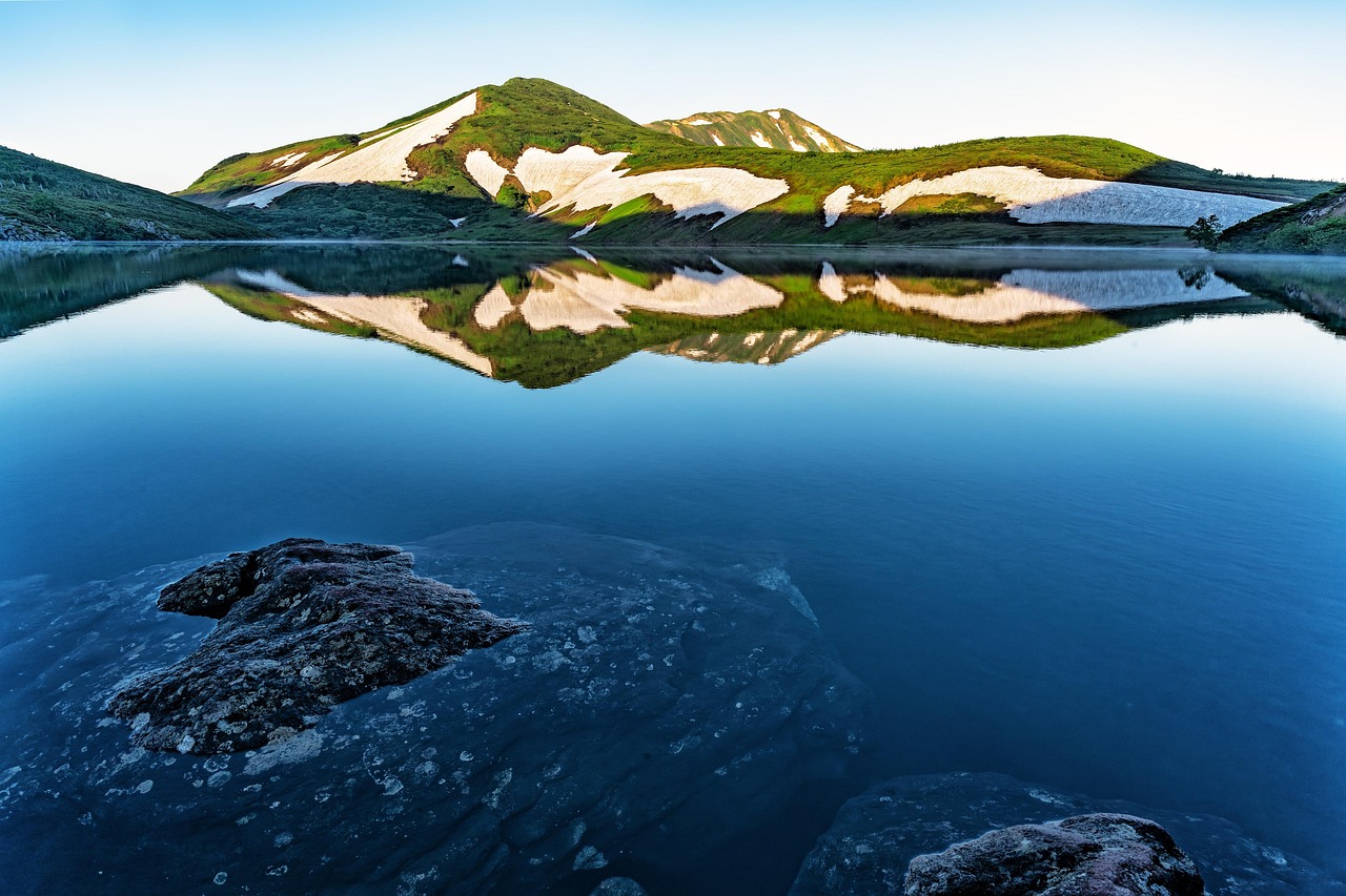 Hakuba in the Japanese Alps for private lodges and a luxury ryokan in snowy landscapes